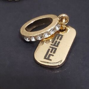 EFFY tag charm with rhinestones, goldtone.
